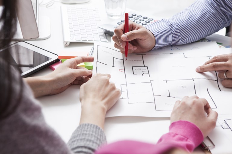 Woman meeting architect for house construction; Shutterstock ID 268567283; PO: Cat Overman; Job: blog post